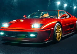 Ferrari F355 by Evoluto rouge aux jantes dorées vue de trois quarts avant dans un tunnel